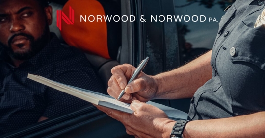 man being cited for a traffic violation